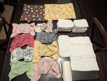 Load image into Gallery viewer, Cloth diaper covers, inserts and 2 wet bags 8 covers. 18 inserts, 1 trifold, 2 wet bags, roll of dry wipes Potty and Diapering
