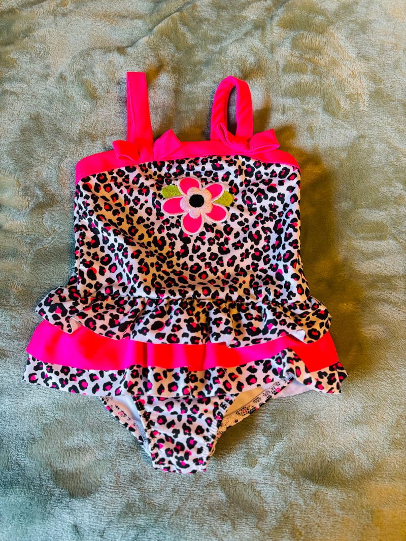 L & D Hot pink cheetah print swimsuit with ruffles around bottom 2T