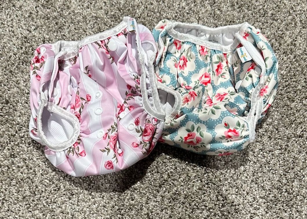 Adjustable reusable swim diapers Can adjust to fit 17-35lb child. Never used Potty and Diapering