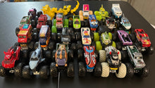 Load image into Gallery viewer, Hot Wheels and Monster Jam 25 Different 1:64 Monster Trucks Toy Vehicles
