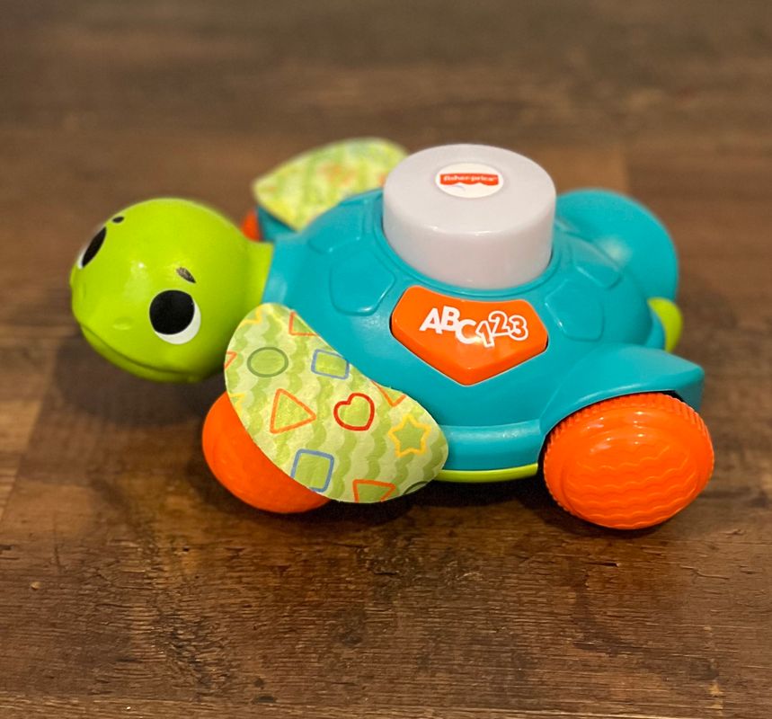 Fischer Price linkamil sit to crawl sea turtle. Needs new batteries Educational