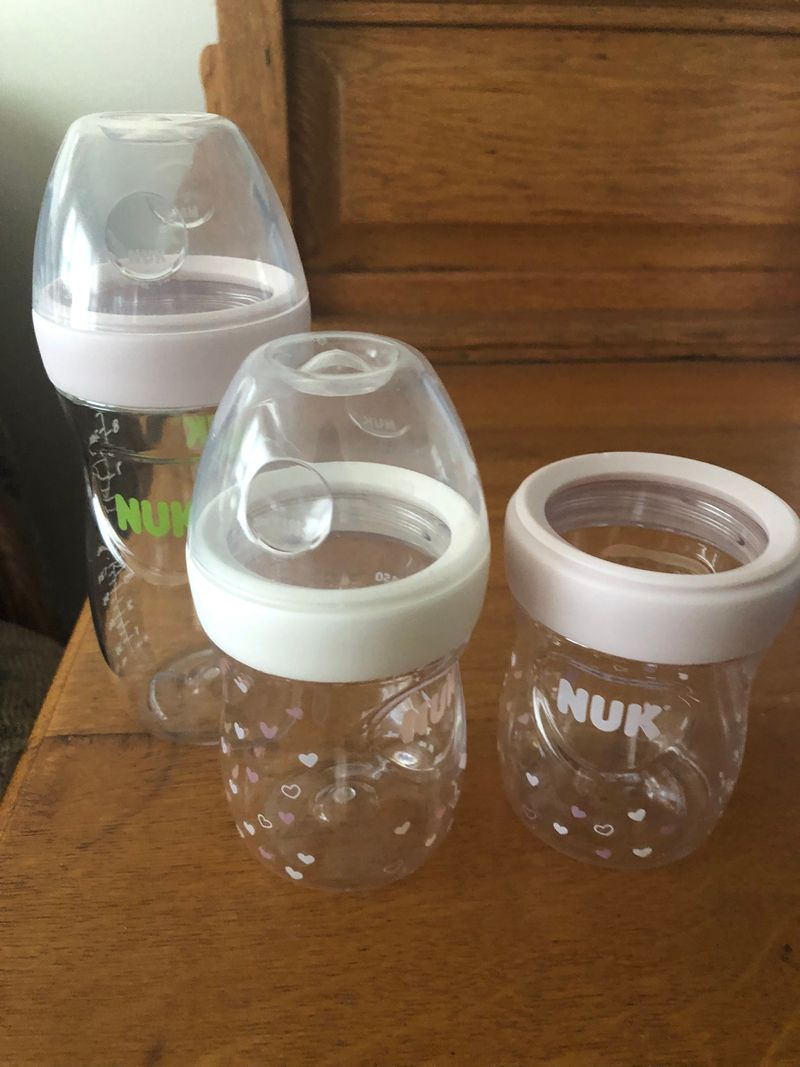 1 Nuk 9oz. bottle and 2 Nuk 5oz. bottles