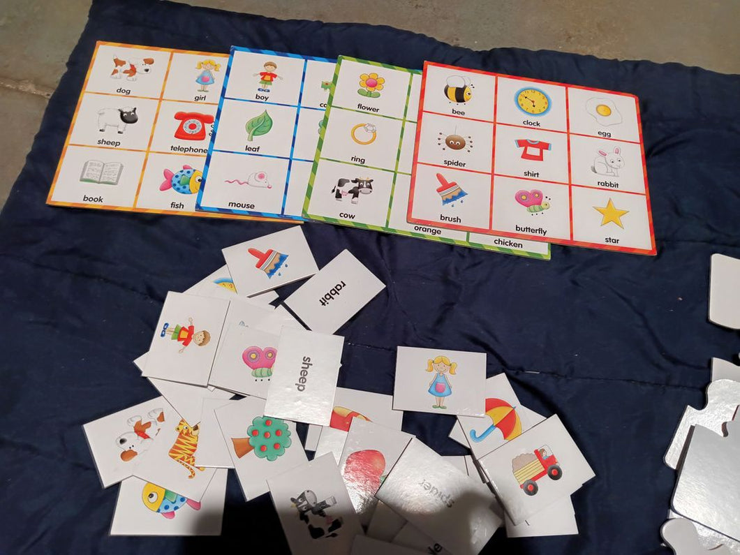 Bingo four playing cards on the back is a differen On the back is a different matching game bingo Educational