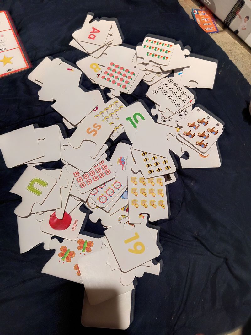 Puzzle educational pieces numbers letters and coun Numbers letters and calendars puzzle is education Educational