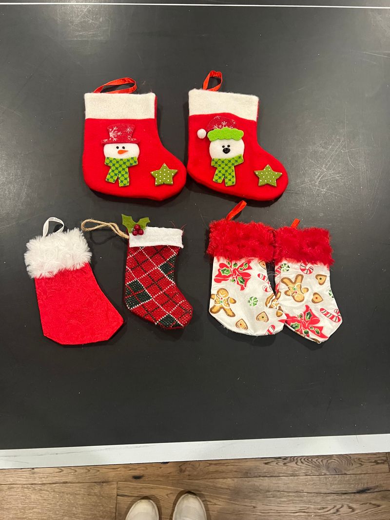 Six miniature decorative stockings Six Christmas stockings miniature