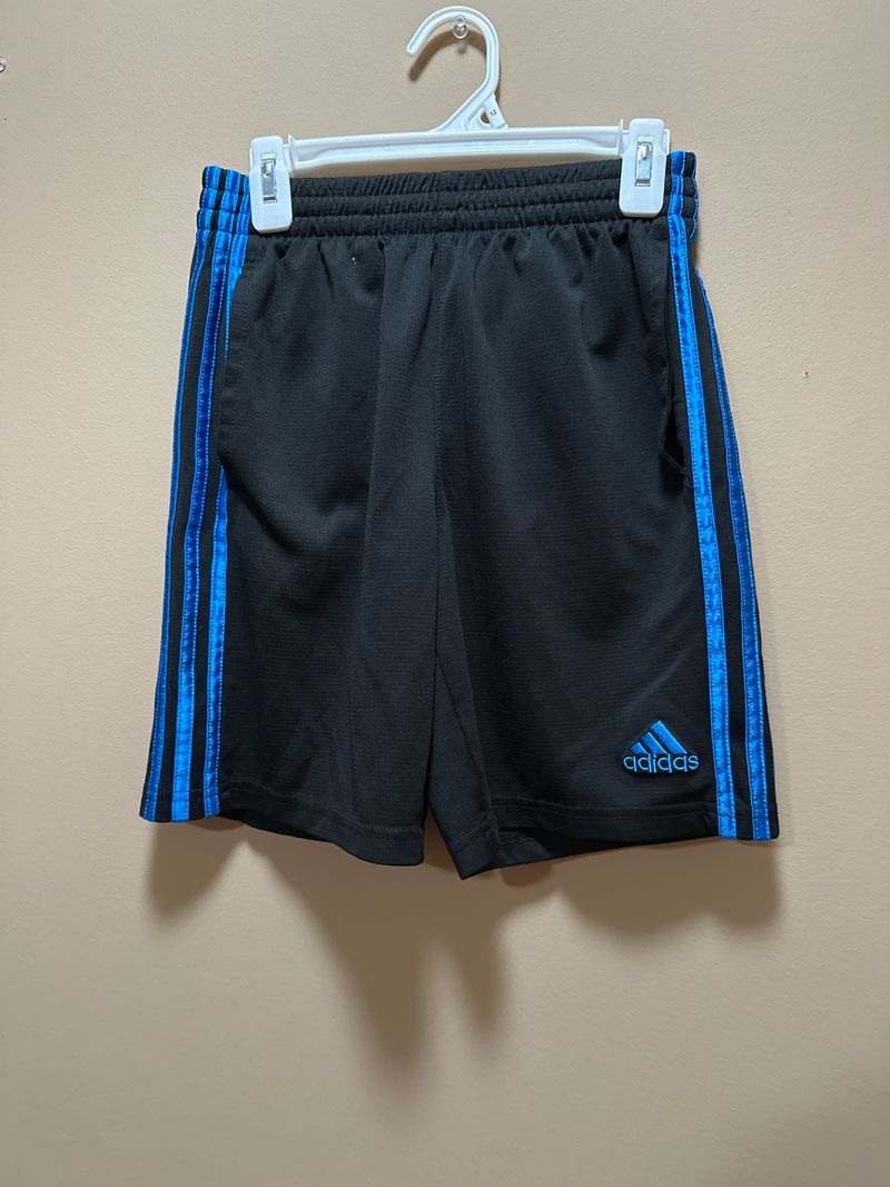 10-12 Adidas black & blue stripe shorts Black shorts w/ Adidas 3 stripes in blue has functional pockets 10