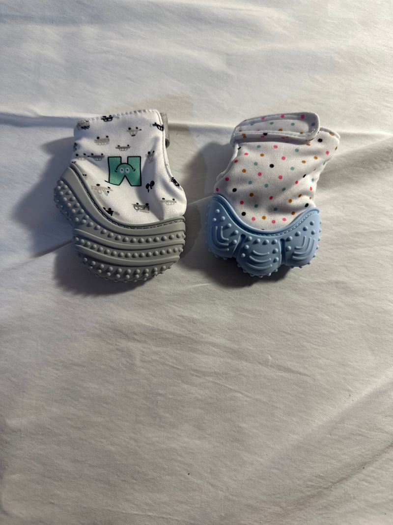 2 teething gloves 2 NWOT never used gloves for teething