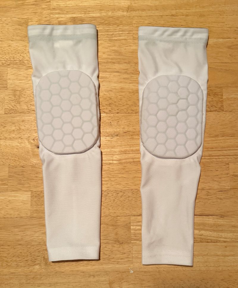 White elbow sleeves w/pads for athletes elbow protection