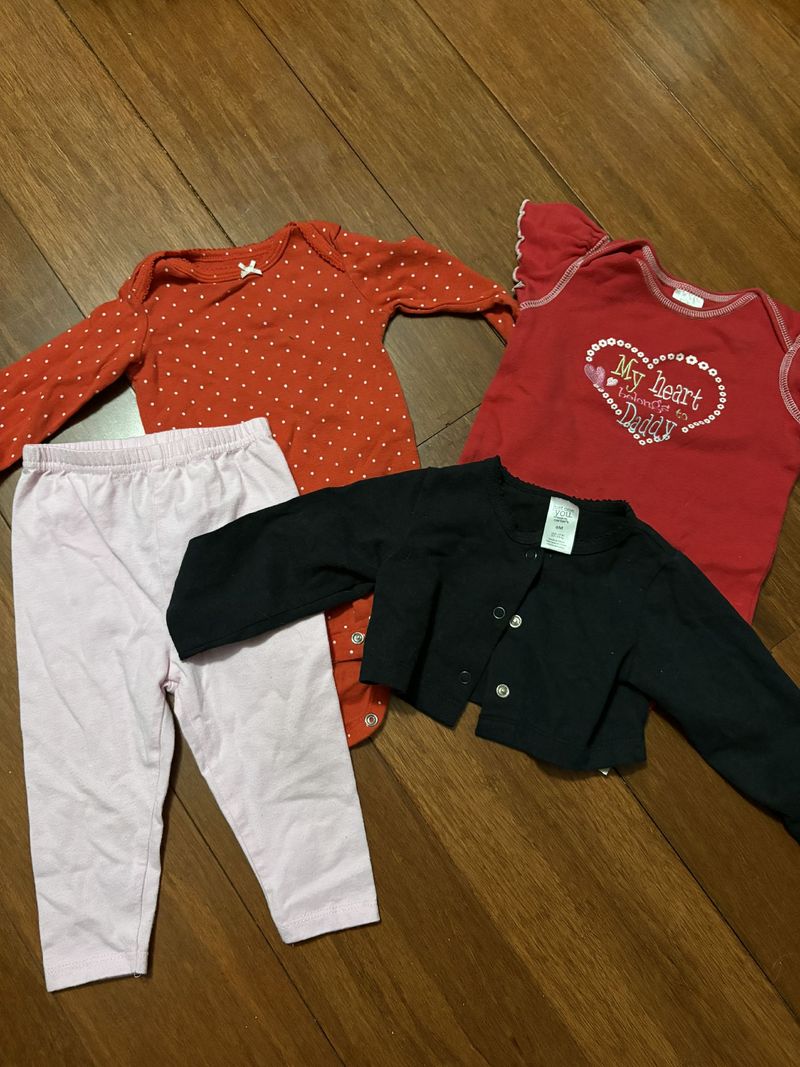 6-9M 1 stretch pink pants, 1 long sleeve, 1 short sleeve, 1 black sweater 6 Months