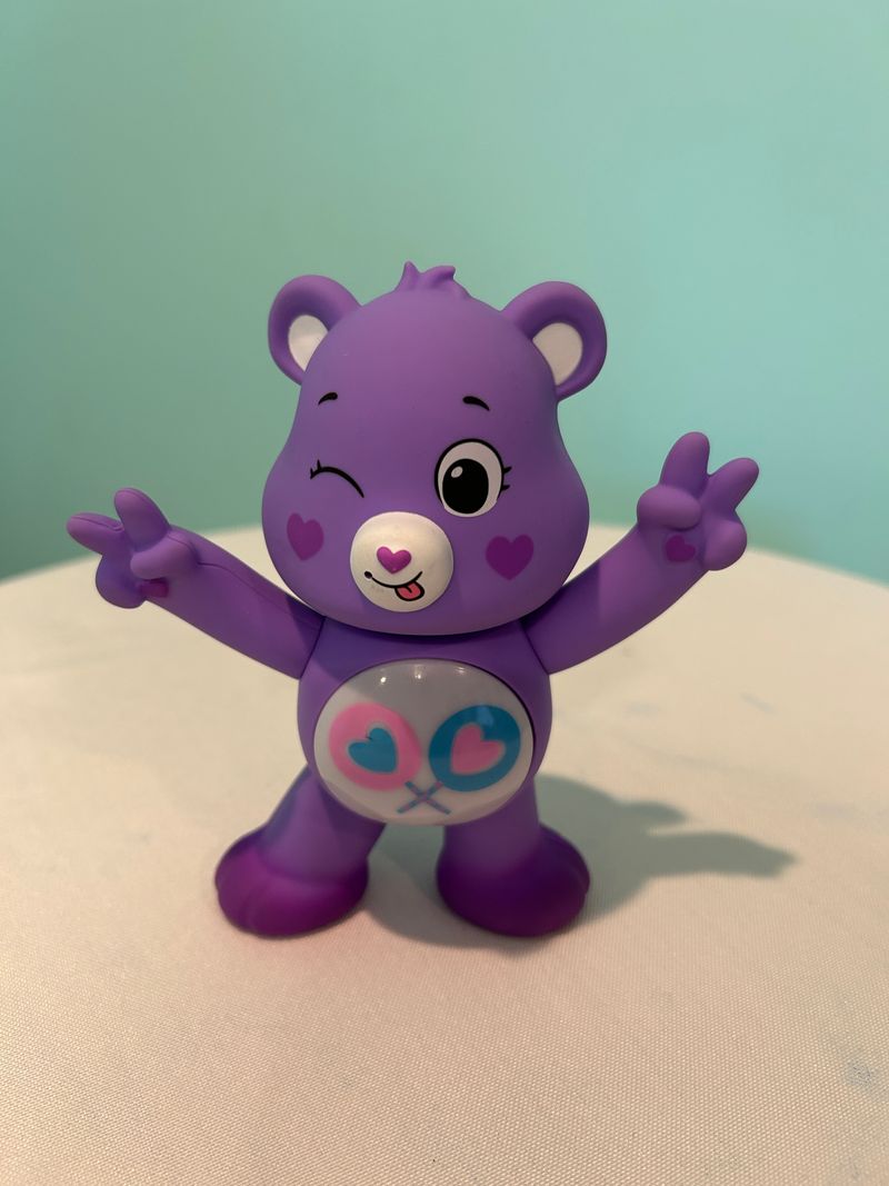 Care Bear Purple Care Bear-talks, has music, and lights up Plush Toys