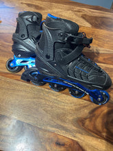 Load image into Gallery viewer, Schwinn GUC blue/black rollerblades size 10-11.5 mens
