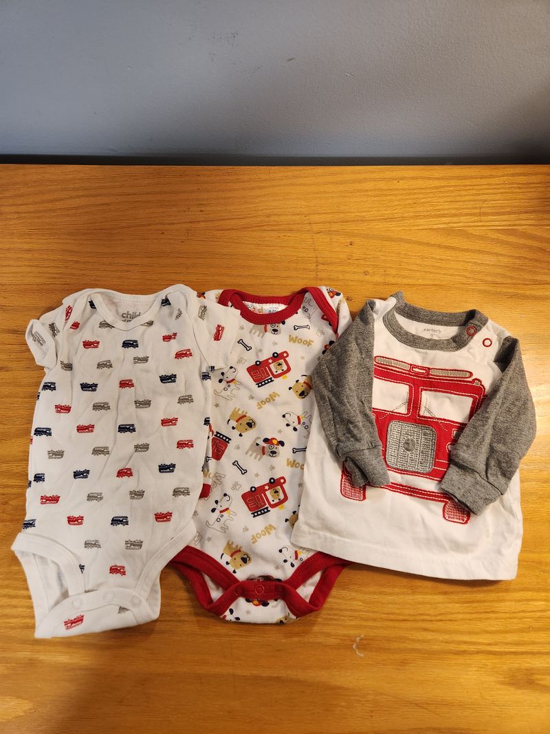 0-3mos. Child of mine 2 long sleeve and 1 short-sleeved Newborn