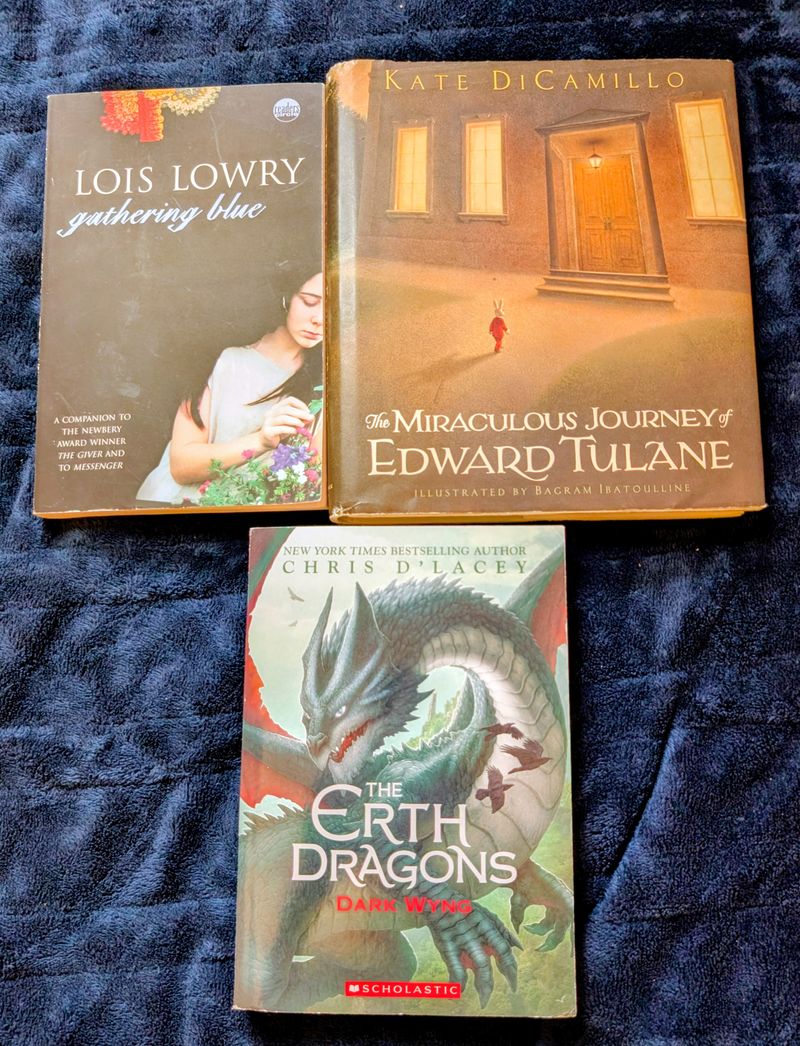 3 fantasy books Gathering blue, Edward Tulane, Erth Dragons Youth Chapter Book