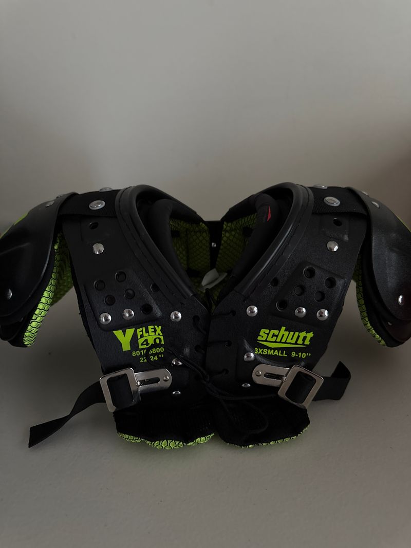 Schutt shoulder pads with back plate size 3XS 9 to 10 inch like new blk and lime green text