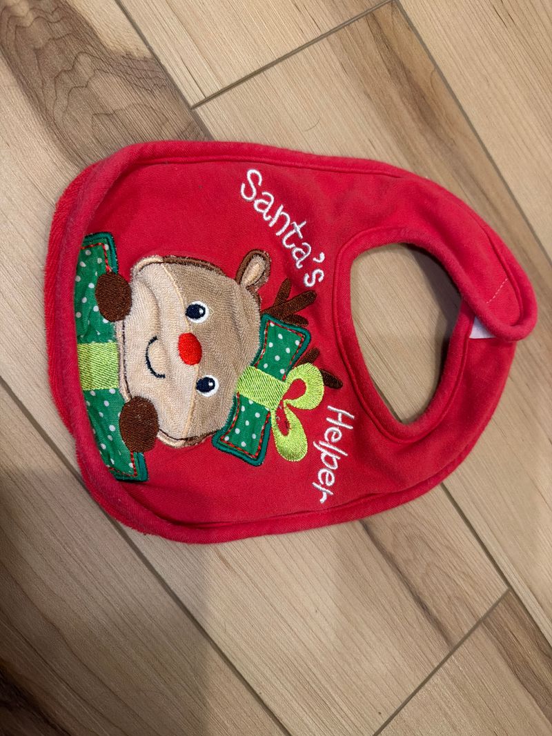Bib, red with reindeer