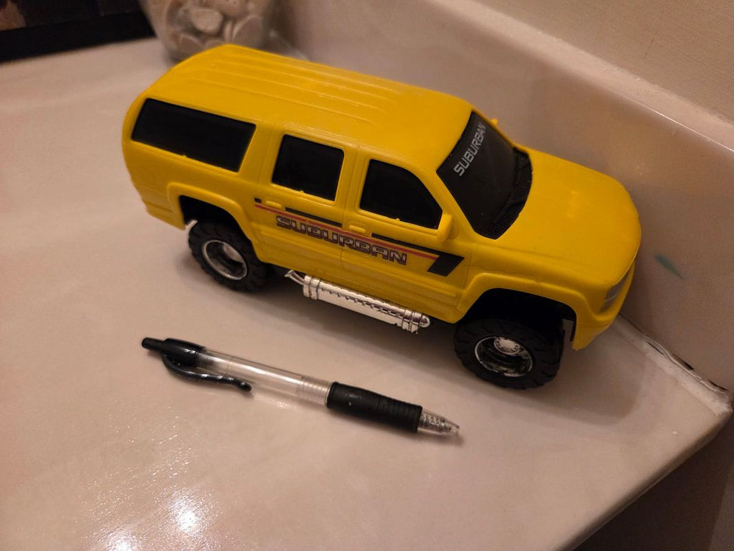 . Yellow svu truck Pretend Toy