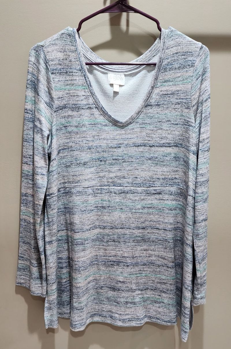 A Glow maternity. Size M. Loose fit shirt. Multi color. Women's Med 8-10