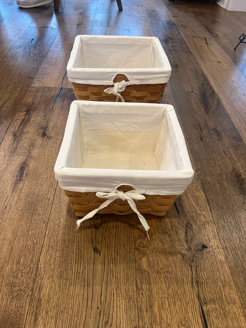 2 wicker baskets with white liners large - 12x7inches small - 10x6inches