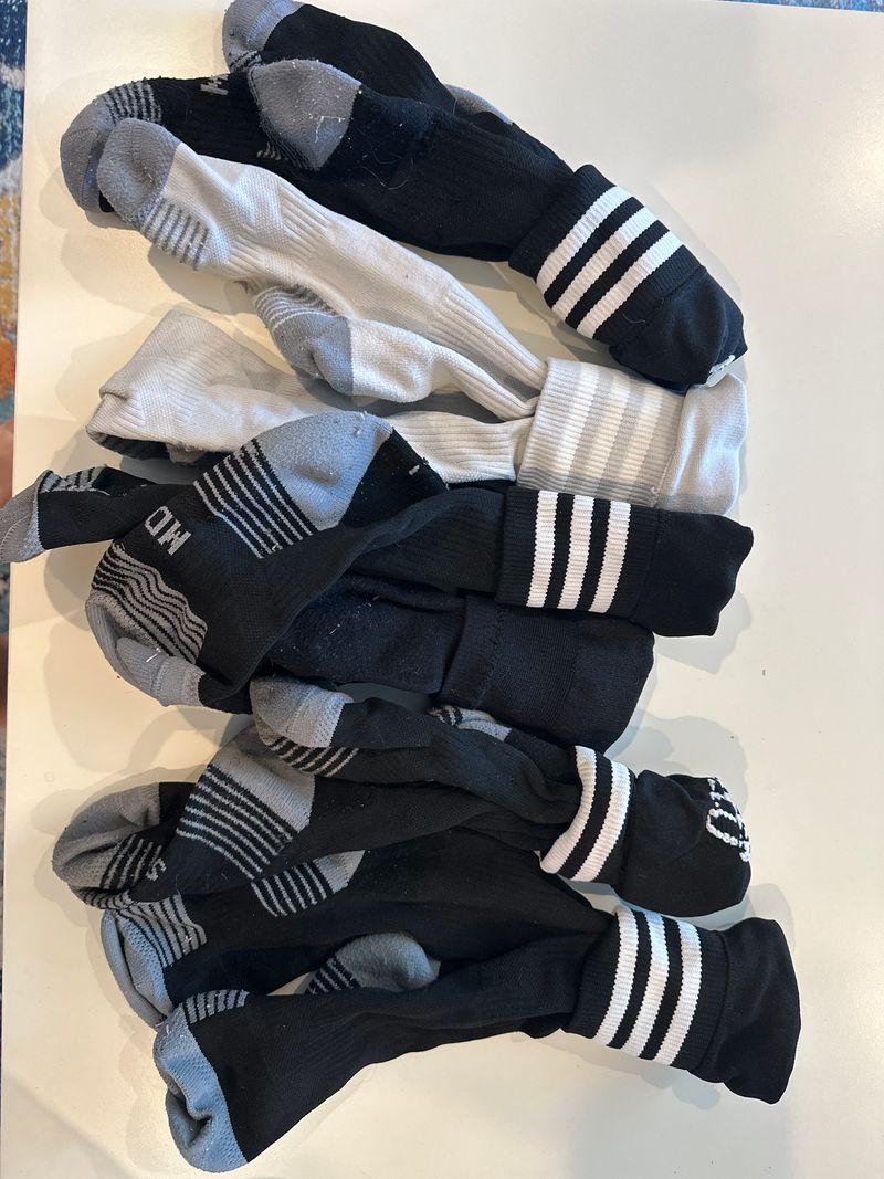 6 pairs of adidas soccer soccers 5 black 1 white, smoke free, dog friendly 8
