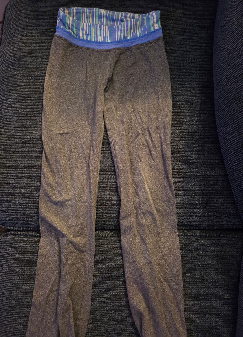 7/8 Grey yoga pants with blue and purple on top 7