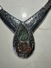 Load image into Gallery viewer, 3 pieces of jewelry Chunky silver pieces, green bracelet, black bracelet, and necklac
