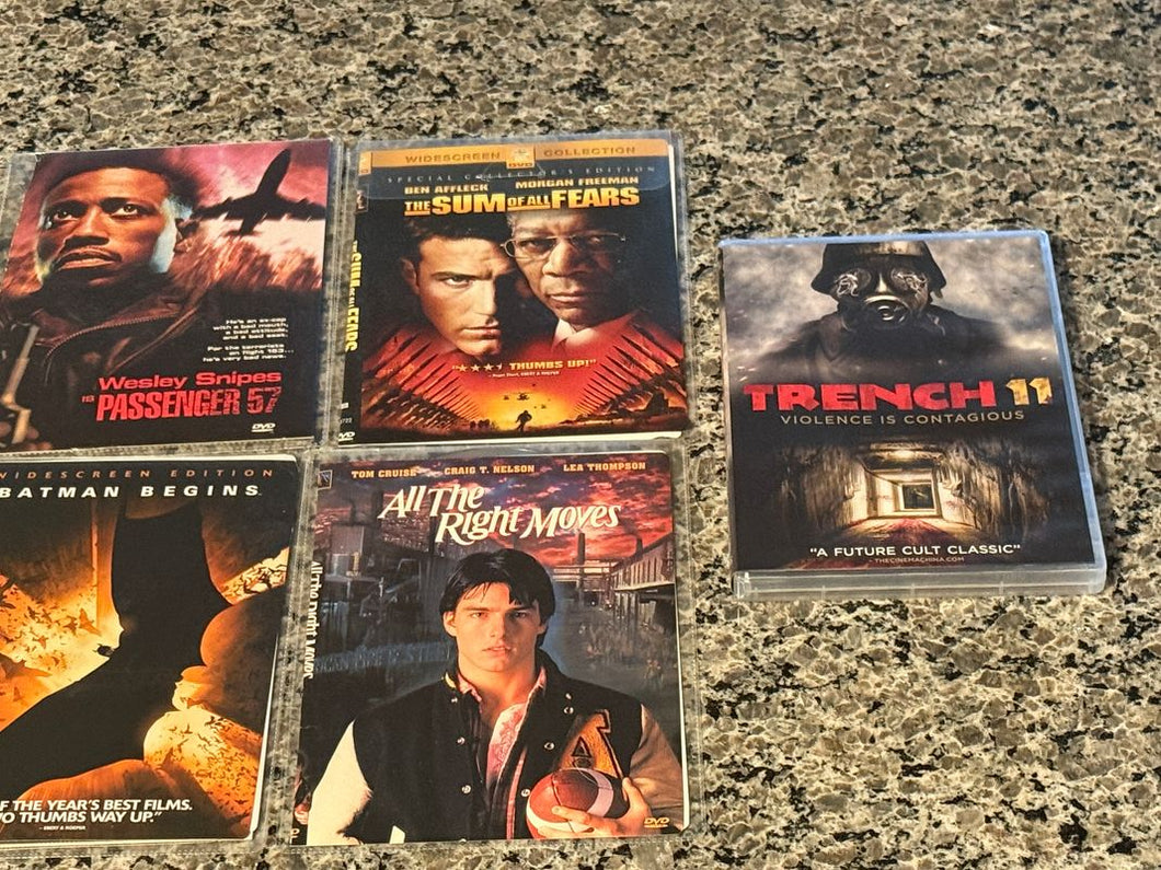 5 movies tench 11 in org case rest in plastic sleeve: pass 57, sum of all fear, Batman begins, all right moves Movies