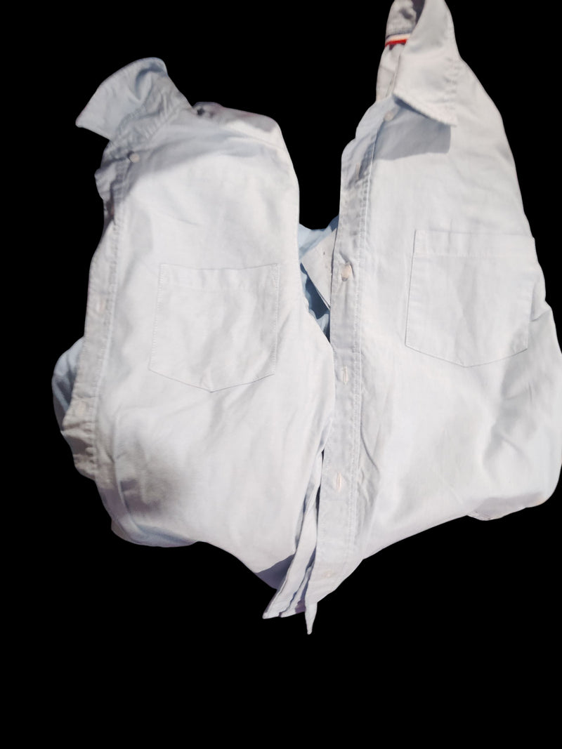 light blue french toast button-up collar shirts I don't know why they look white but they're light blue 14