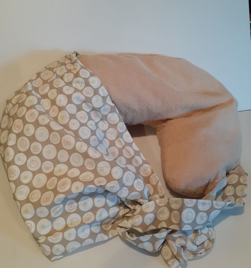 Tineo Tan breastfeeding pillow with attached nursing cover