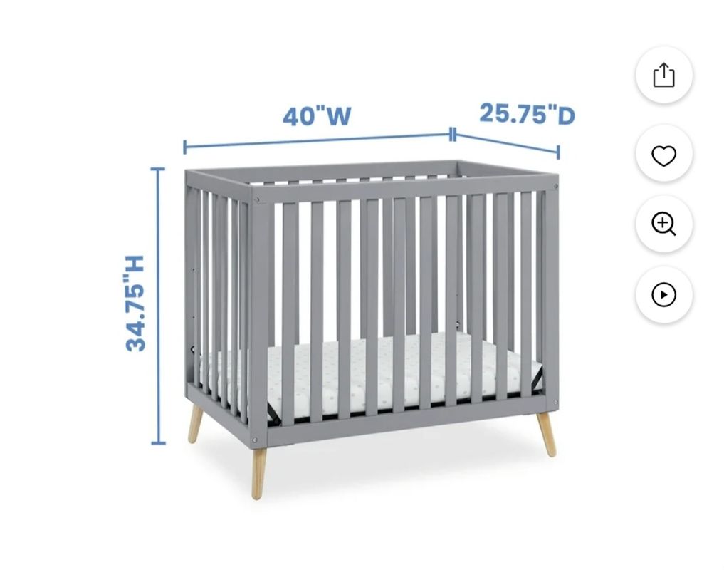 Delta Mini Crib Mini gray w/ maple legs. Teeth marks. Has mattress Crib
