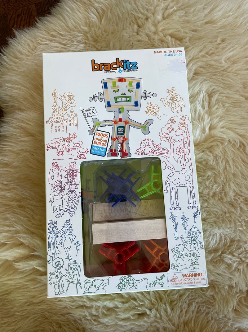 Brackitz building set 42 piece set Wood pieces and colorful plastic brackets Building