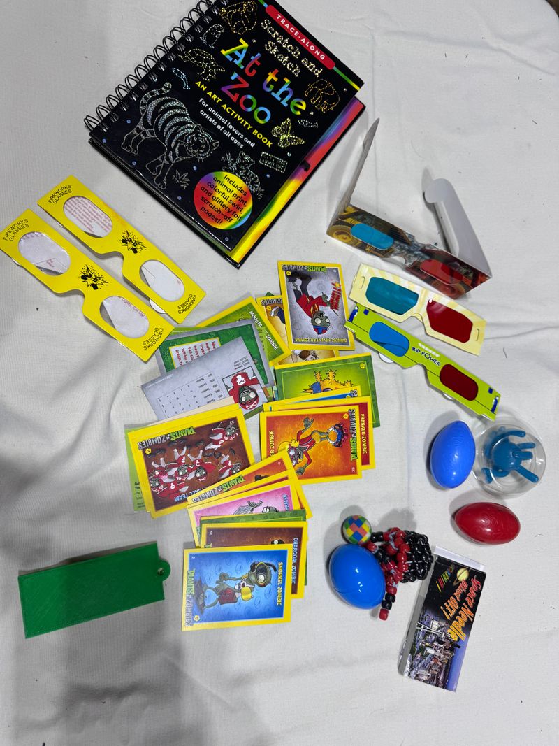 3D glasses zombie cards Silly putty and other misc items Pretend Toy