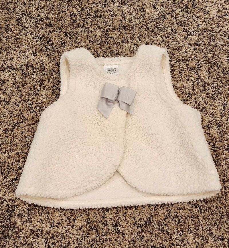 3 mo white sherpa vest with 2 top snaps.  3 Months