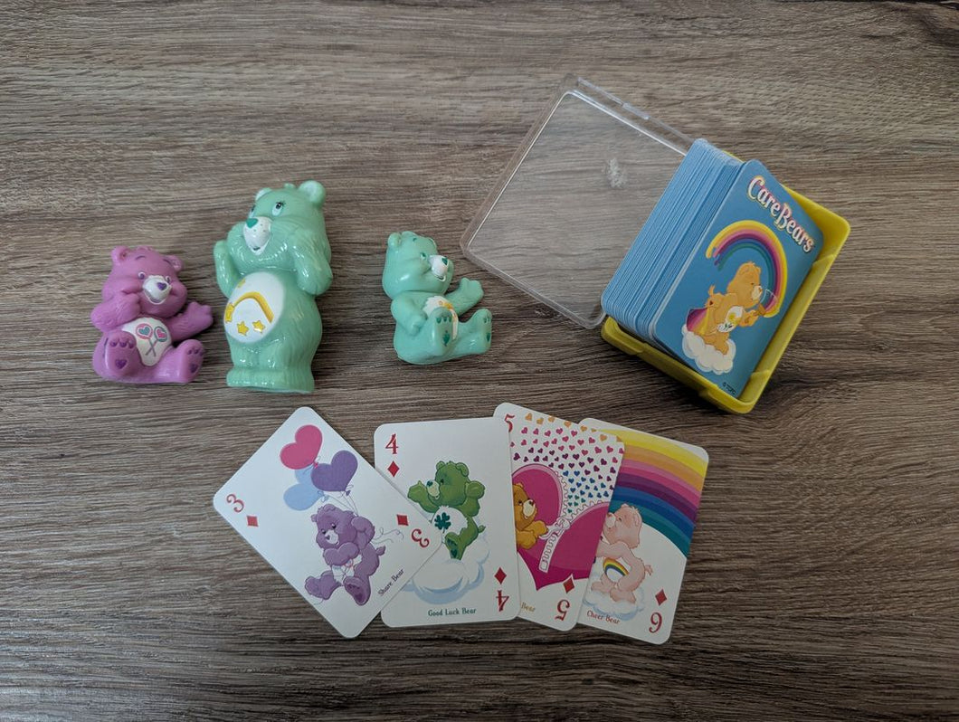Care Bears Toy Lot includes 3 Care Bears figurines and card deck, about 2 in tall Figures and Animals