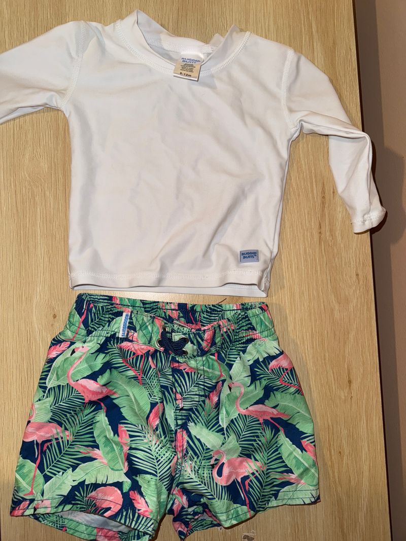 Rugged Butts white swim top and flamingo swim shorts. Size 6-12 9 Months