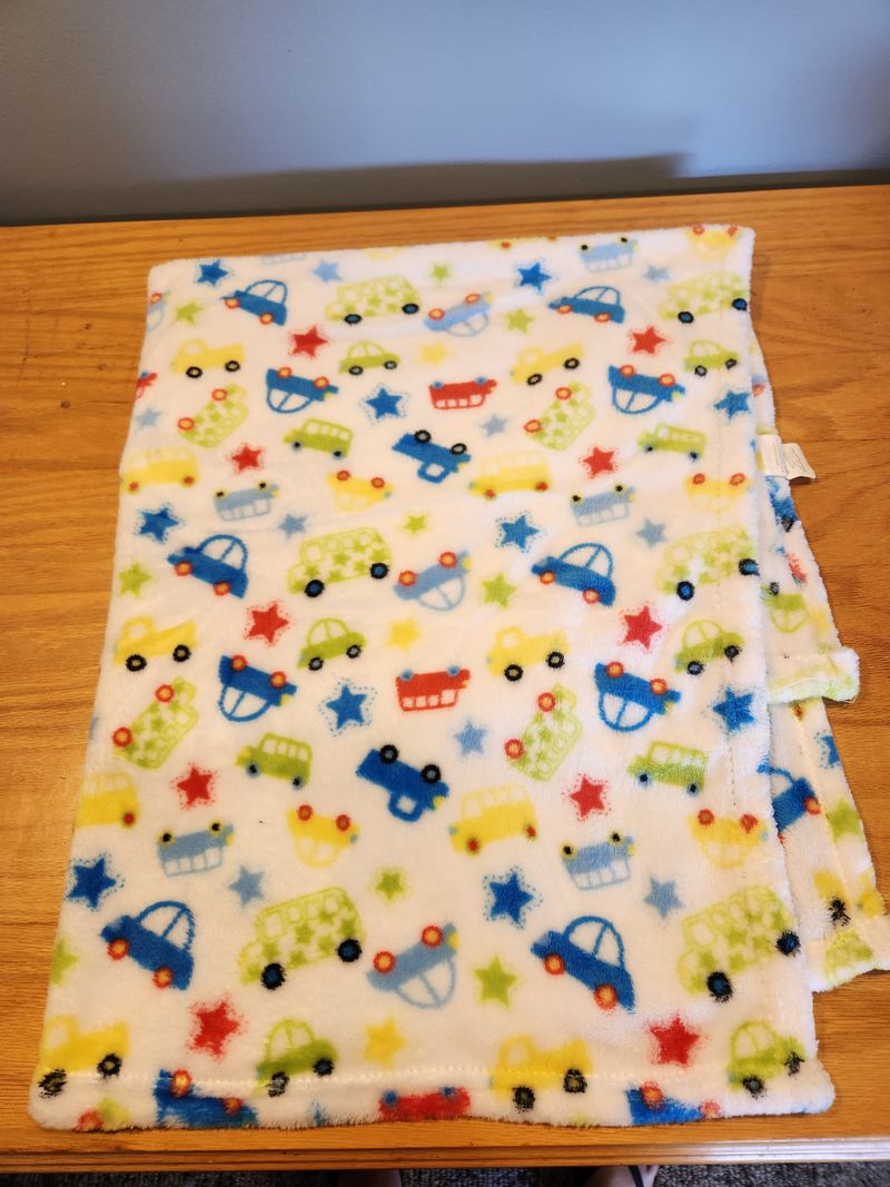 Gentle steps Truck pattern plush baby blanket 2.5 x 5, like new Blanket