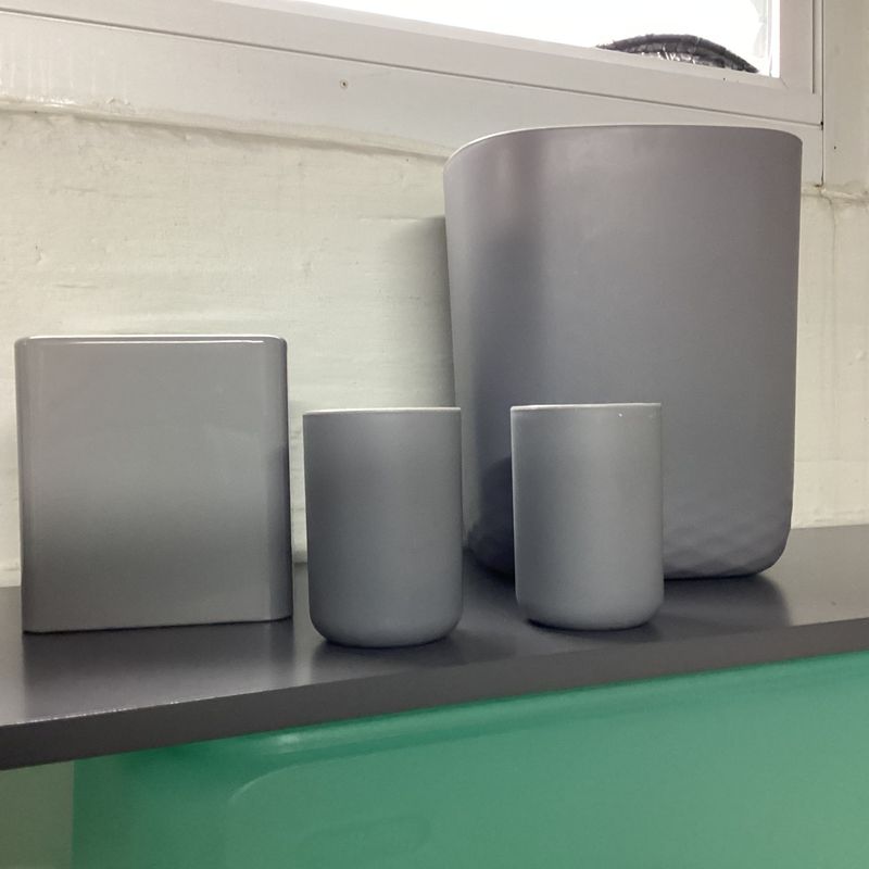 Unknown Gray tissue box cover, waste can, and 2 cups