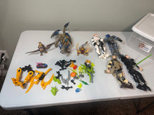 Load image into Gallery viewer, Lego bionacle set Inc 4 Star Wars figures 3 animals and random pieces and a bin labeled! Building
