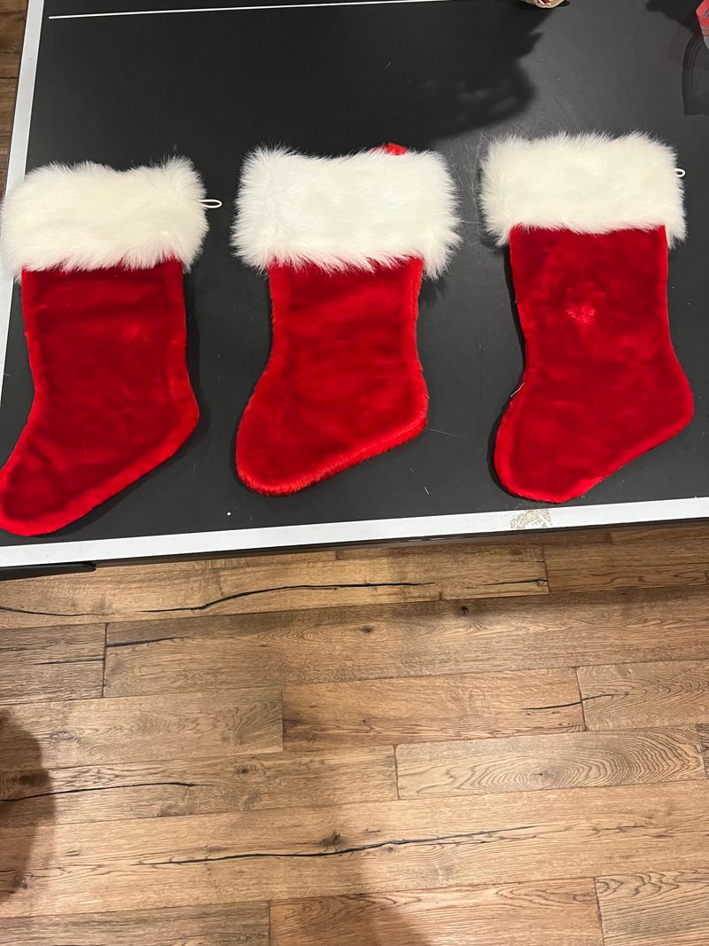 3 large Christmas stockings Three red velvet with white fur line stockings
