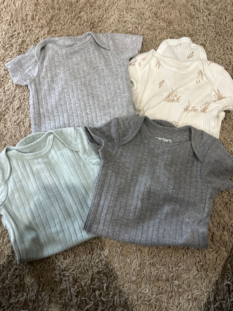 Carters Set of 4 ribbed onesies Newborn