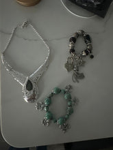 Load image into Gallery viewer, 3 pieces of jewelry Chunky silver pieces, green bracelet, black bracelet, and necklac
