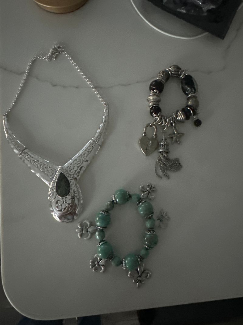 3 pieces of jewelry Chunky silver pieces, green bracelet, black bracelet, and necklac
