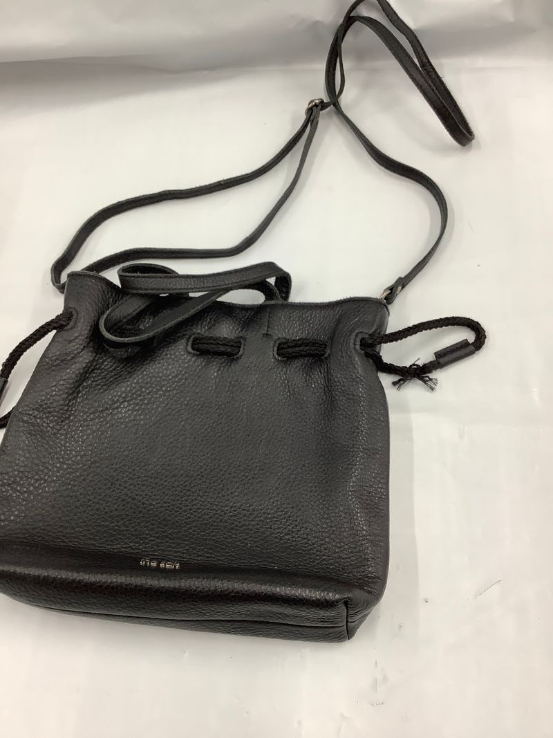 The Sak GUC The Sak black leather drawstring bag, see photo for condition