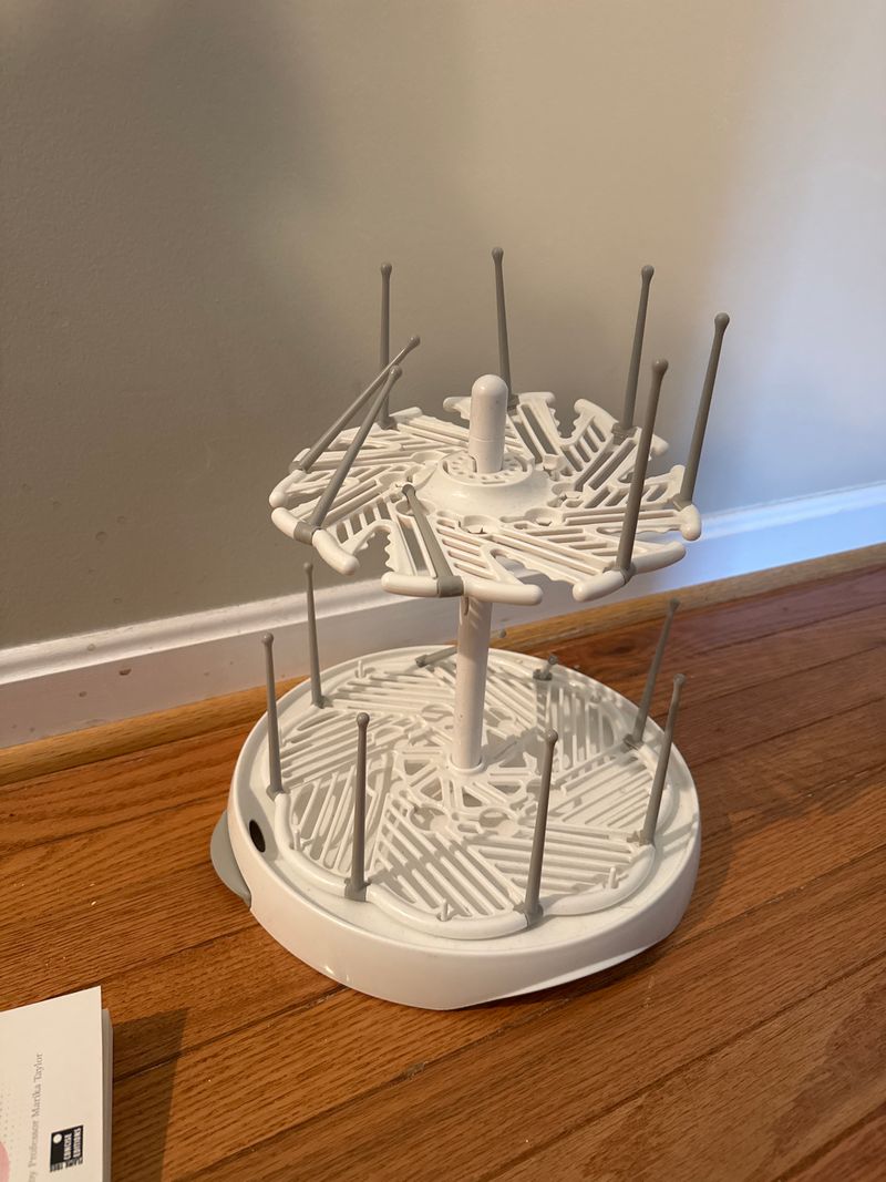 Bottle drying rack Prongs collapse, tiers spin