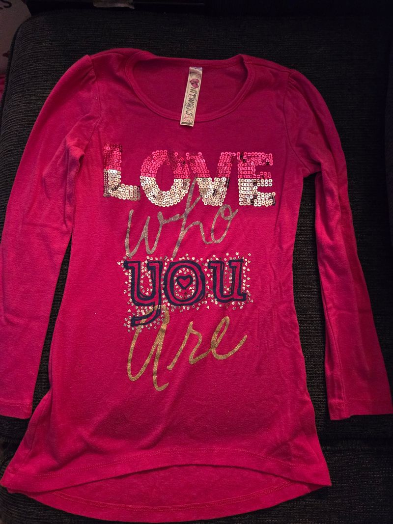 Size M fits a 10 Pink love who you are 10
