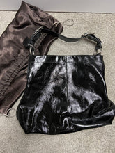 Load image into Gallery viewer, Authentic Coach Bucket Bag Black patent with teal interior. Some discoloration on interior
