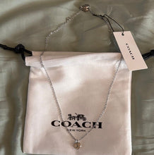 Load image into Gallery viewer, Coach  Necklace with Heart Shaped Pendant NWT New with tags. 16in. Silver over brass. Reg $95 Jewelry
