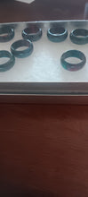 Load image into Gallery viewer, Rings lot Hard plastic it feels like, 8 rings in all,  varies sizes Jewelry
