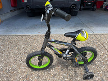 Load image into Gallery viewer, Kids Huffy Rock It 12 in Bike Great used condition w training wheels Ride-On Toy
