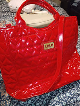 Load image into Gallery viewer, Lulu shiny red purse very few flaws From what I see it's only one on the handle see picture Purse
