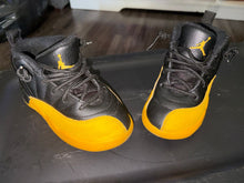 Load image into Gallery viewer, Jordan Retro 12s black and yellow jordans. Used 9 (Lil' Kid)
